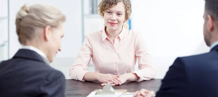 woman-smiling-during-recruitment-review-PVBE8TT